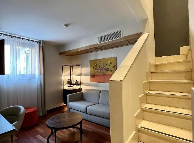 호텔 Nh Collection Palacio De Castellanos 4*